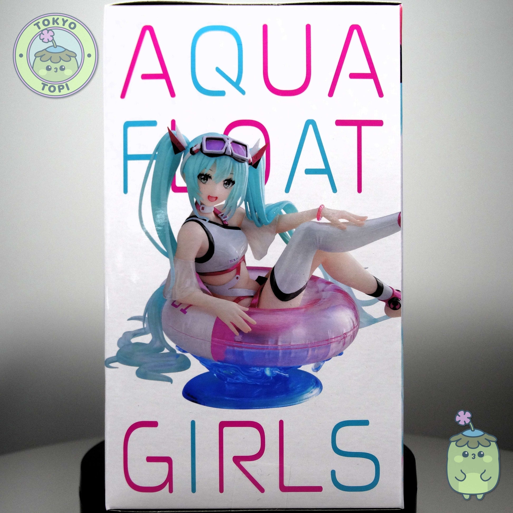 This Taito-crafted collectible features Hatsune Miku rendered in aquatic attire, positioned on a floating ring with integrated water base display stand. Standing approximately 10cm tall, the figure introduces dynamic visual interest and dimensional variety to any collection. An ideal acquisition for enthusiasts seeking distinctive character representations with premium manufacturing quality.
