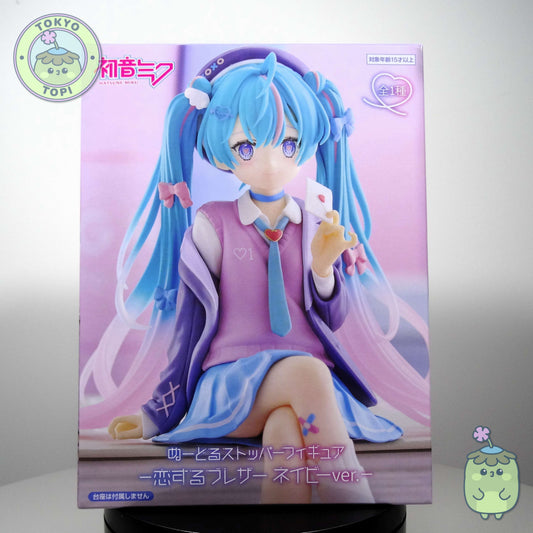 This charming Noodle Stopper captures Hatsune Miku in her iconic Blazer in Love Navy outfit. Standing approximately 14cm tall, the figure showcases meticulous craftsmanship with carefully rendered details across her distinctive hair and delicate leg tattoo. The pink and blue colour palette perfectly complements the character's signature aesthetic, making it an essential addition for devoted collectors and fans of the beloved virtual idol.