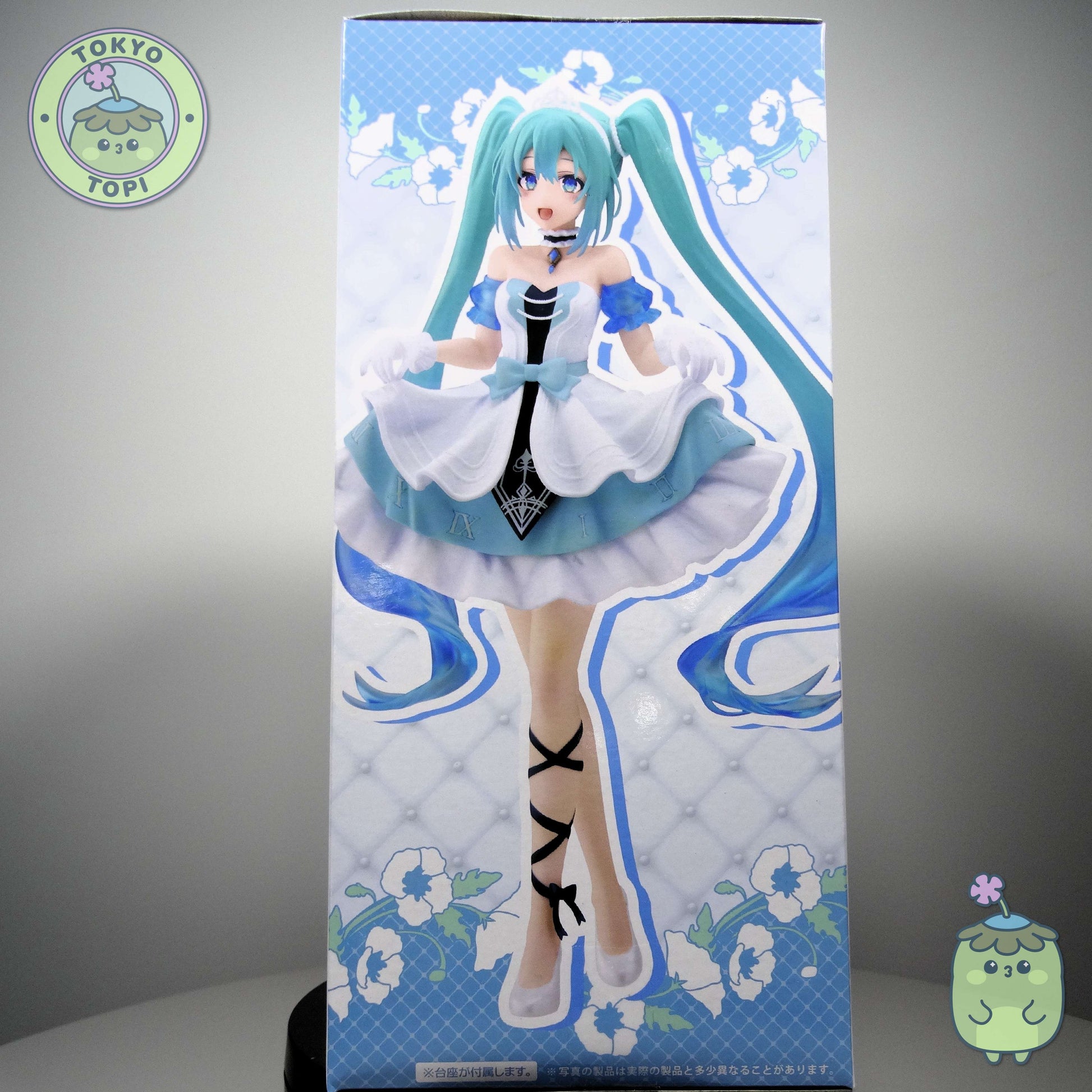 This Taito figure captures the iconic Hatsune Miku in an enchanting Cinderella-inspired design, complete with ornate necklace and intricately detailed skirt embellishments. Standing approximately 18cm tall, it's a sophisticated collectible that appeals to both seasoned enthusiasts and those beginning their figure collection. The refined craftsmanship and thematic presentation make it a distinguished addition to any display.