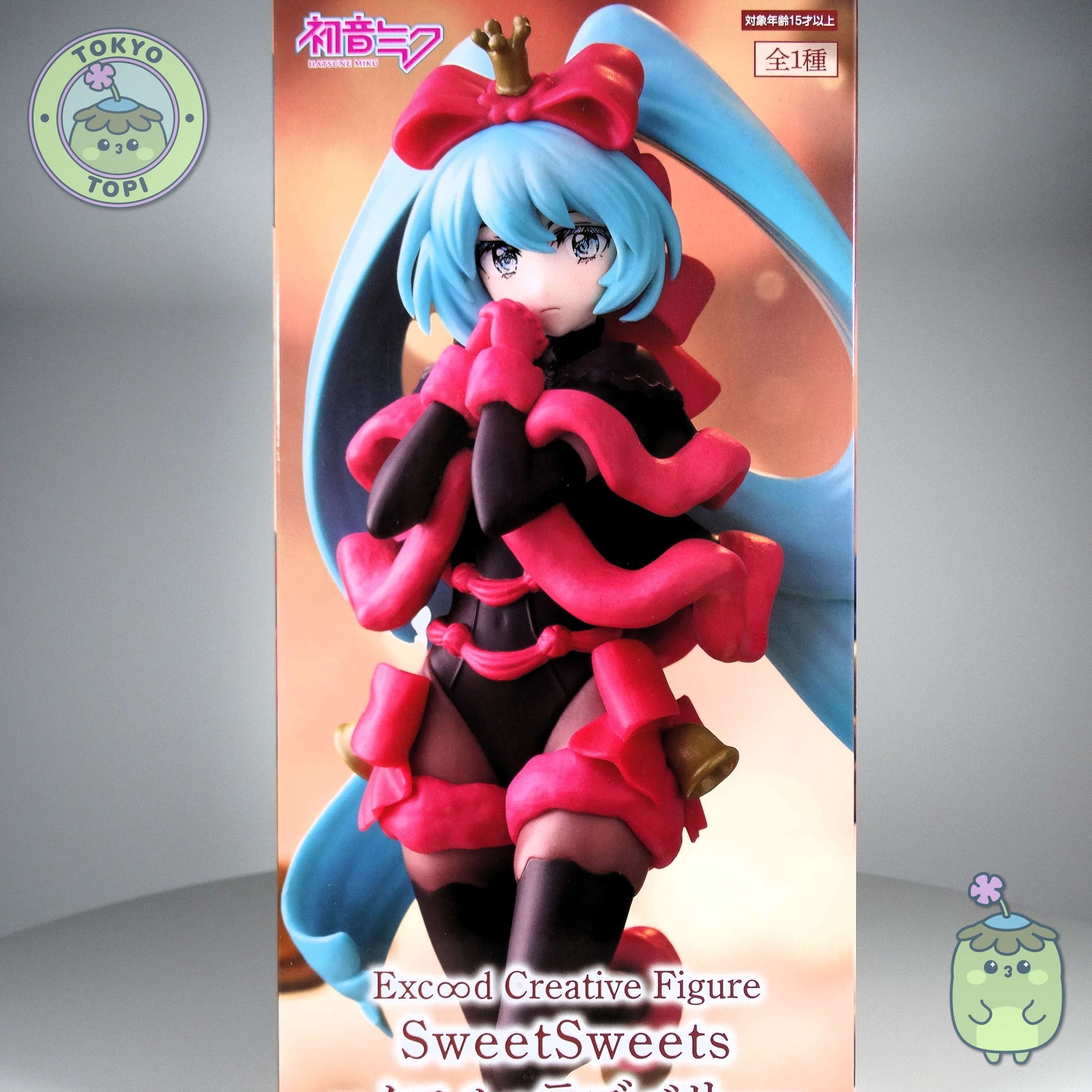 This festive Hatsune Miku figure showcases the beloved character in an uncommon darker palette, crafted by Furyu's SweetSweets Noel Raspberry collection. Standing approximately 21cm tall, the figure arrives with an innovative creative stand designed to resemble a decorative plate, adding visual interest to any display. Perfect for collectors seeking a distinctive seasonal interpretation of this iconic character.