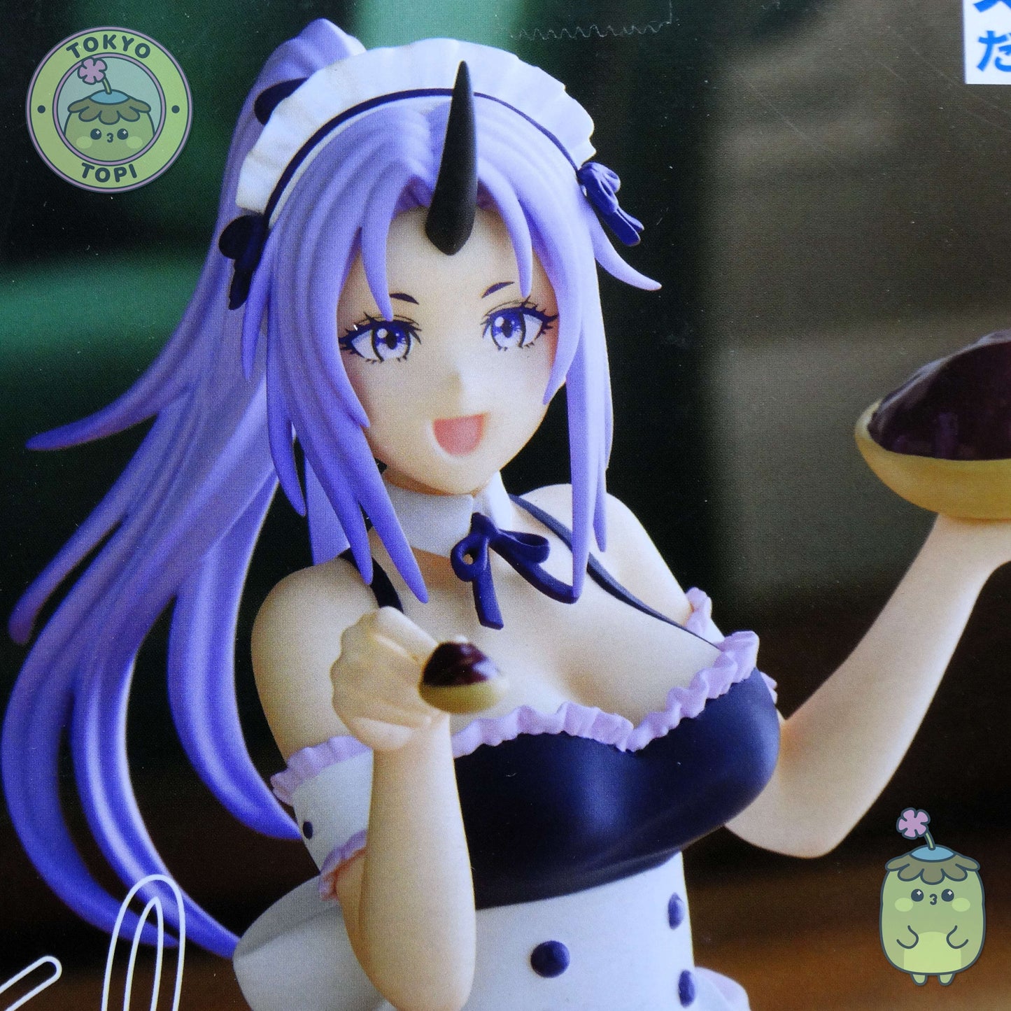 Super cute maid version of Shion from That Time I got Reincarnated as a Slime by Banpresto holding a chocolate cake in a cute maid outit with apron and bow.