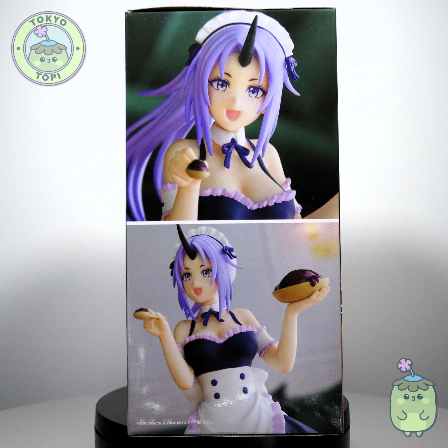 Super cute maid version of Shion from That Time I got Reincarnated as a Slime by Banpresto holding a chocolate cake in a cute maid outit with apron and bow.