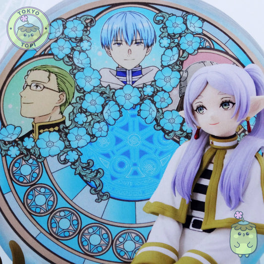 Figure of Frieren from an anime with a stained glass window behind her with other characters from the show including Himmel.