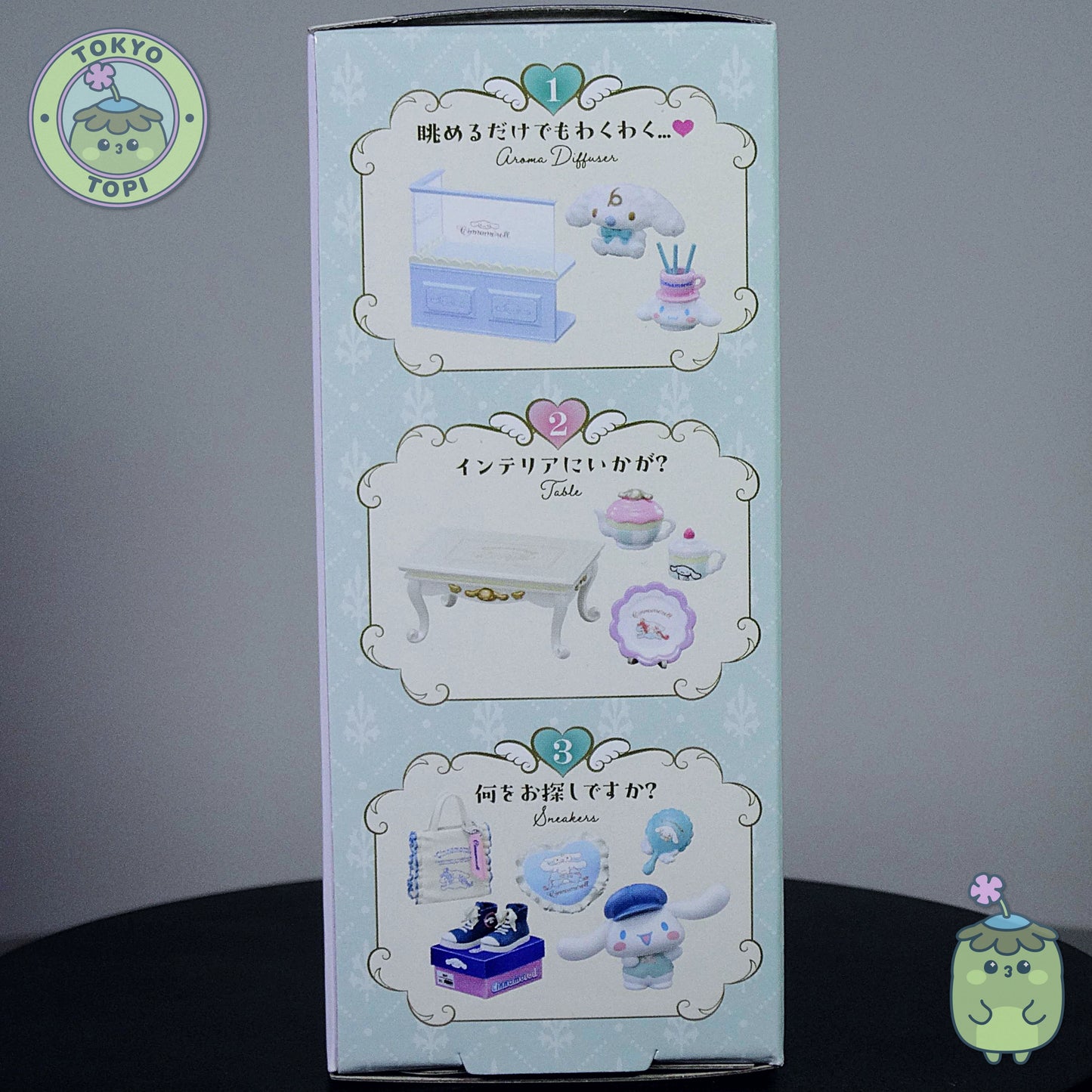 Product from Sanrio of mini figurespackaging with illustrations and text on a gray background