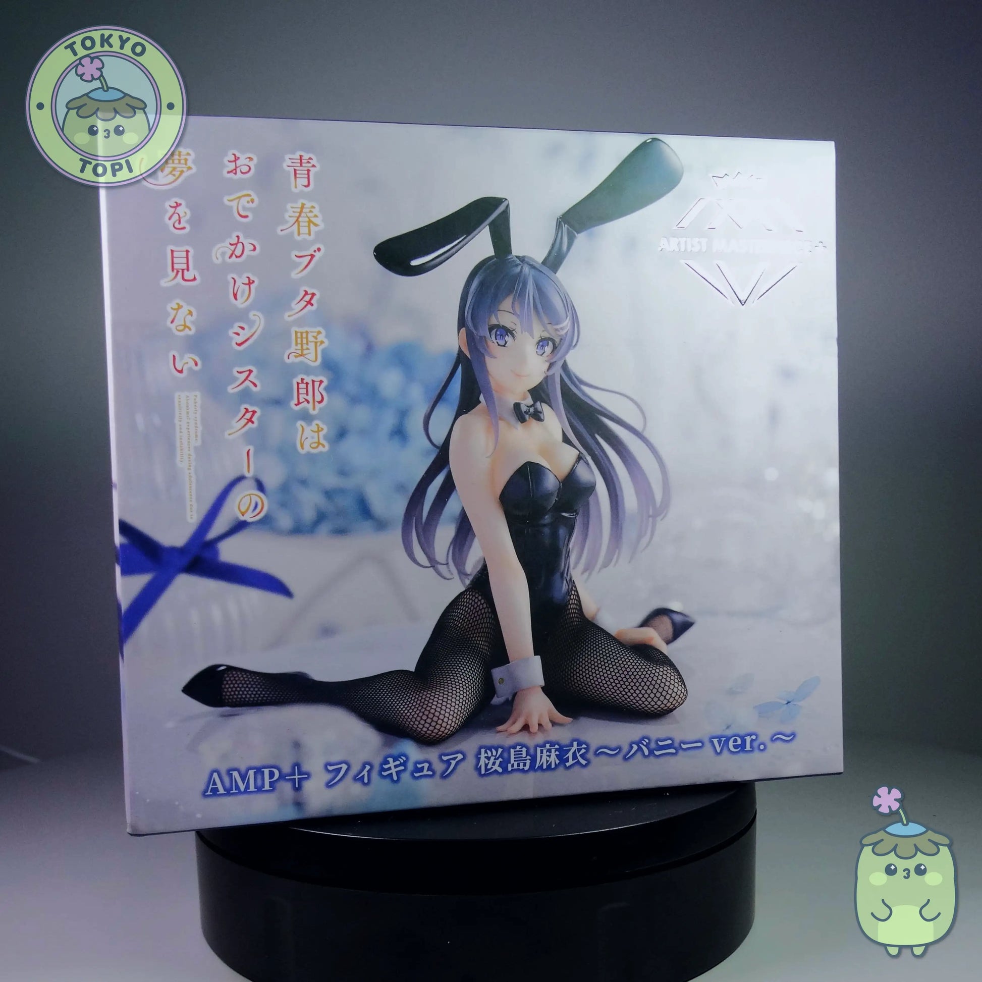 Box packaging of a figurine of bunny version girl from Rascal dose not dream of Bunny girl senpai. Black version. Fishnet tights and cute bowtie.