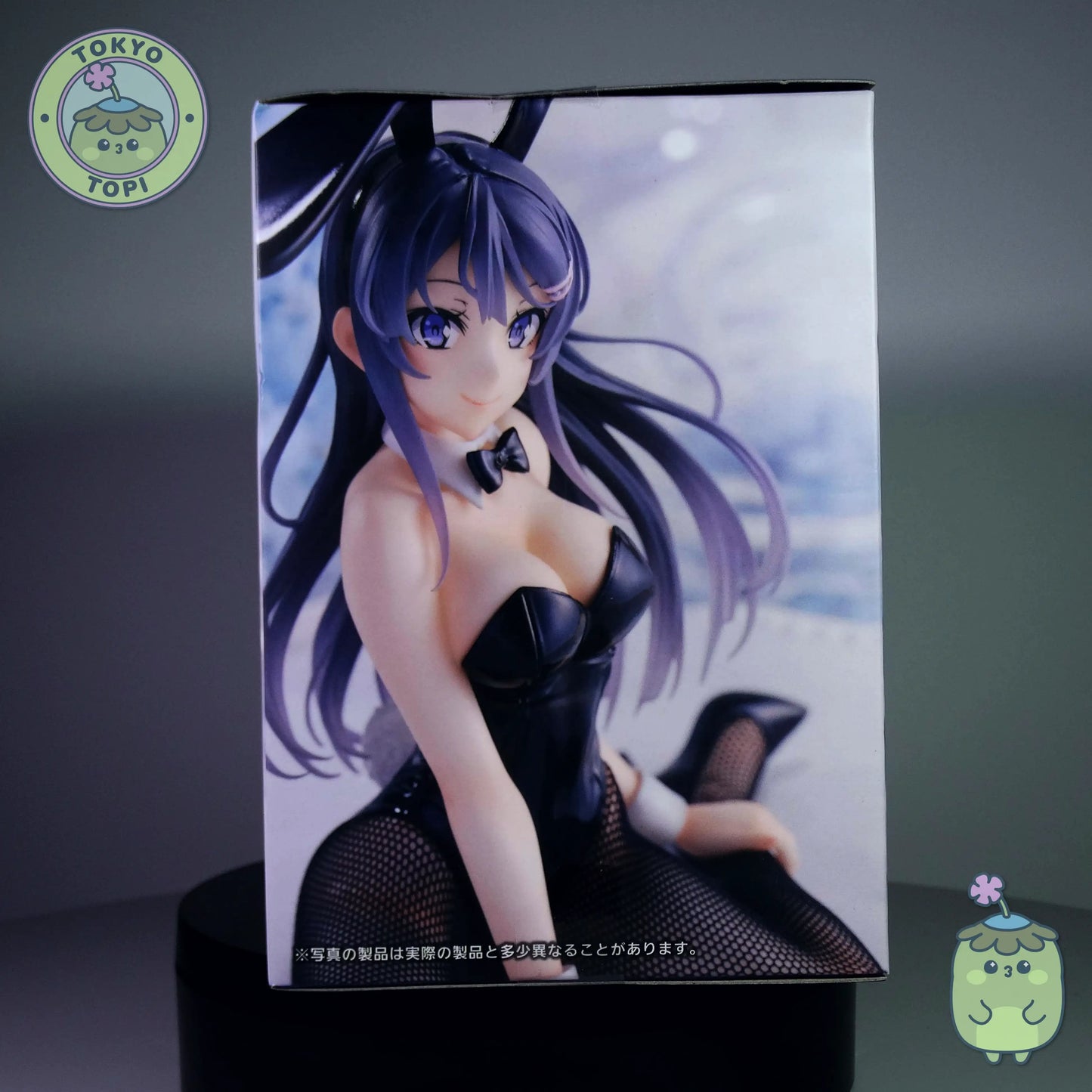 Box packaging of a figurine of bunny version girl from Rascal dose not dream of Bunny girl senpai. Black version. Fishnet tights and cute bowtie.