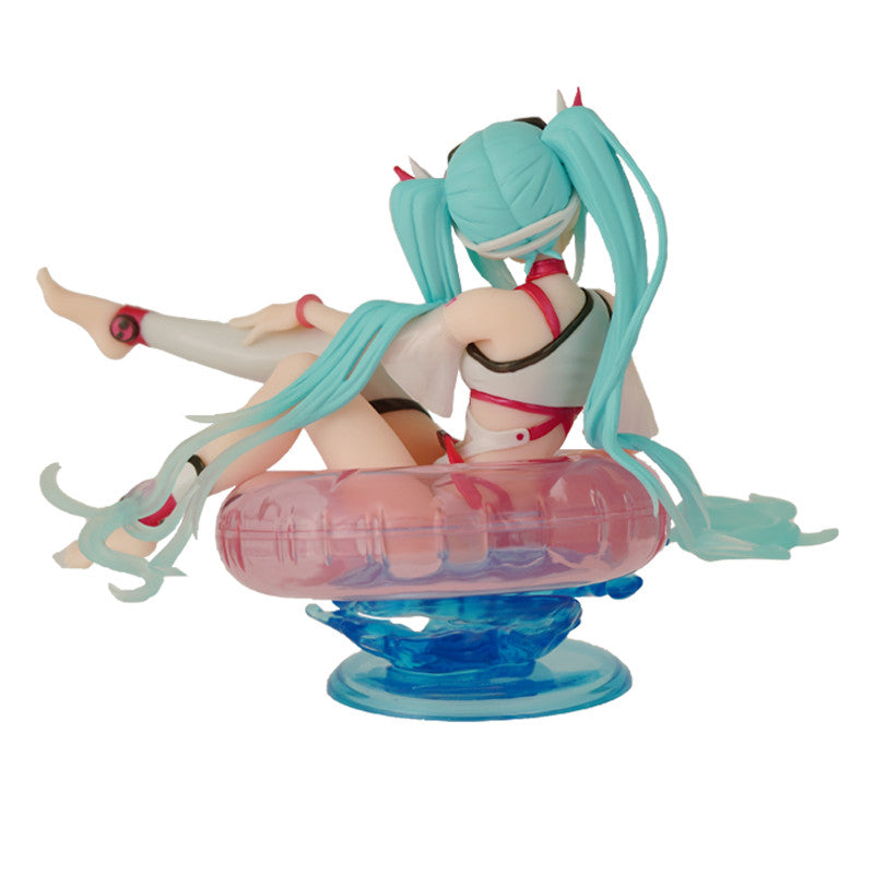 This Taito-crafted collectible features Hatsune Miku rendered in aquatic attire, positioned on a floating ring with integrated water base display stand. Standing approximately 10cm tall, the figure introduces dynamic visual interest and dimensional variety to any collection. An ideal acquisition for enthusiasts seeking distinctive character representations with premium manufacturing quality.
